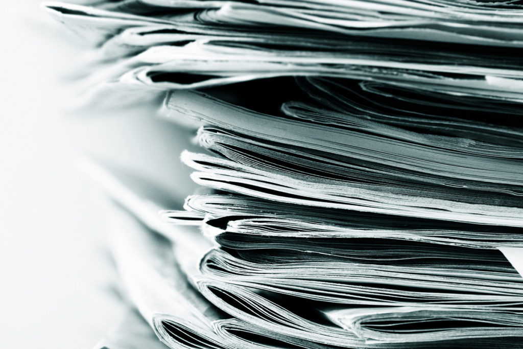 Newspaper-Stack-1200x800