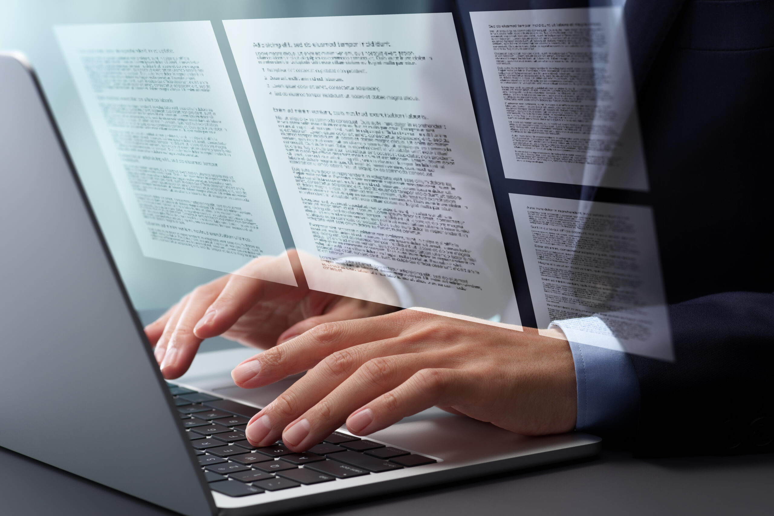 Person writing out a statement on a laptop.
